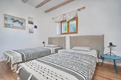Krevet ili kreveti u jedinici u objektu Hvar luxury Villa and pool with view in heart of Stari Grad