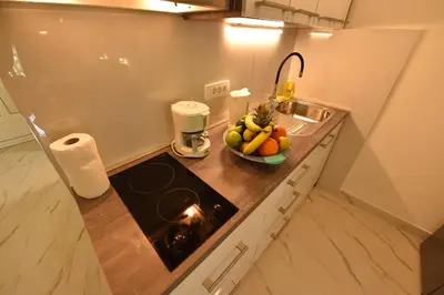 Kuhinja ili čajna kuhinja u objektu Beach Apartments Vlado
