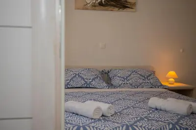 Krevet ili kreveti u jedinici u objektu Apartment with big and free private parking