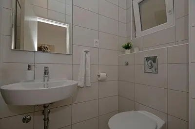 Kupaonica u objektu Apartment with big and free private parking