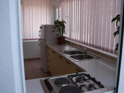 Kuhinja ili čajna kuhinja u objektu Apartments Curin
