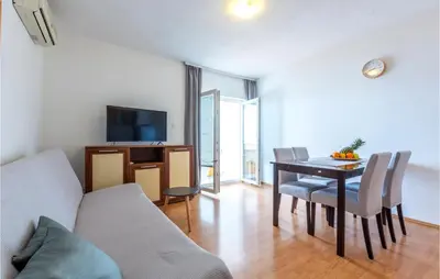 TV i/ili zabavni centar u objektu Lovely Apartment In Pisak With Wifi