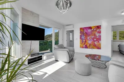 TV i/ili zabavni centar u objektu Exclusive Penthouse Big Blue with private Jacuzzi