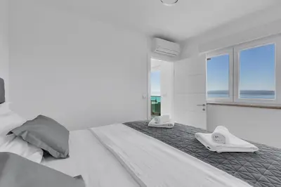 Krevet ili kreveti u jedinici u objektu Exclusive Penthouse Big Blue with private Jacuzzi