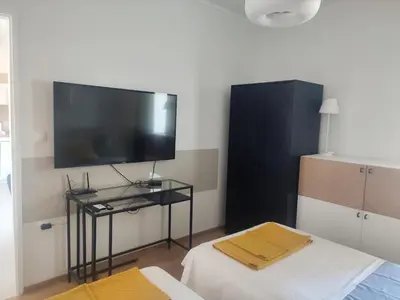 TV i/ili zabavni centar u objektu Apartment ROSE, CLOSE TO THE BEACH