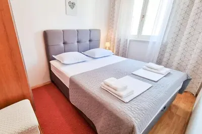 Krevet ili kreveti u jedinici u objektu Apartment Merry Center & Beach