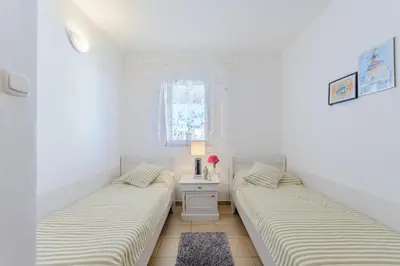 Krevet ili kreveti u jedinici u objektu Beach front apartment Wojtek