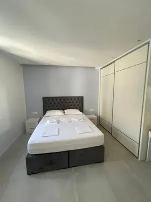 Krevet ili kreveti u jedinici u objektu New Modern Deluxe Apartmens Domo