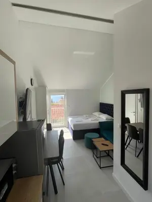 Krevet ili kreveti u jedinici u objektu New Modern Deluxe Apartmens Domo