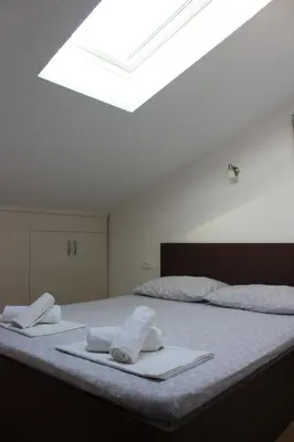 Krevet ili kreveti u jedinici u objektu Sara Apartments
