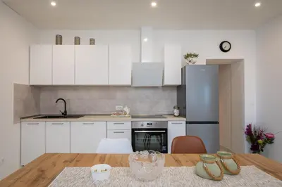 Kuhinja ili čajna kuhinja u objektu Blue Lagoon Beach Apartments