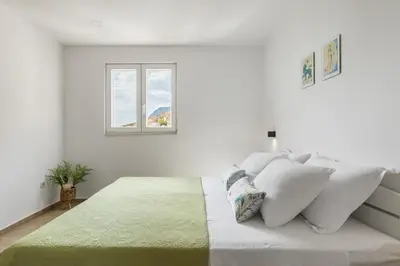 Krevet ili kreveti u jedinici u objektu Bona fide sea view apartments