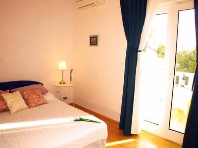 Krevet ili kreveti u jedinici u objektu Apartments Dani želja