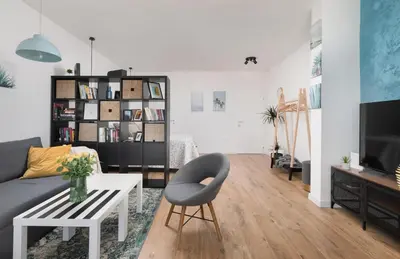 TV i/ili zabavni centar u objektu Apartments Left & Right with jacuzzi, 4 stars