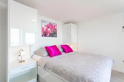 Krevet ili kreveti u jedinici u objektu Villa King Apartments