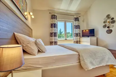 Krevet ili kreveti u jedinici u objektu Villa SAN with heated pool, traditional surroundings, 3-bedrooms