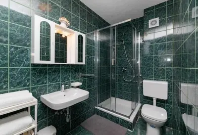 Kupaonica u objektu Apartment in Supetar with sea view, terrace, air conditioning, W-LAN 3553-1