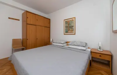 Krevet ili kreveti u jedinici u objektu Apartment in Supetar with sea view, balcony, air conditioning, W-LAN 3553-2