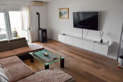 TV i/ili zabavni centar u objektu Beautiful place near the sea