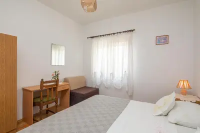 Krevet ili kreveti u jedinici u objektu A2 apt near beach w patio parking and grill