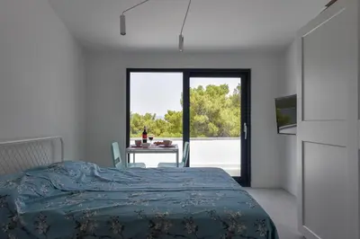 Krevet ili kreveti u jedinici u objektu Lazaneo Seafront Apartments, Jelsa Hvar