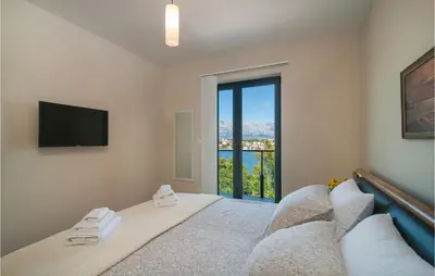 Krevet ili kreveti u jedinici u objektu Gorgeous Apartment In Selca With House Sea View