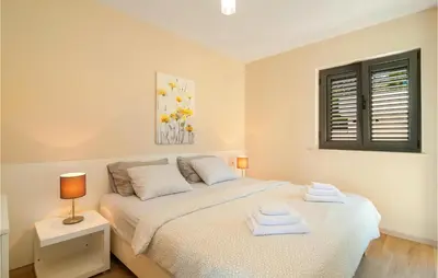 Krevet ili kreveti u jedinici u objektu Gorgeous Apartment In Selca With House Sea View