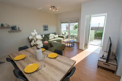 TV i/ili zabavni centar u objektu Comfort City Center Apartment