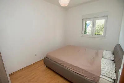 Krevet ili kreveti u jedinici u objektu Comfort City Center Apartment