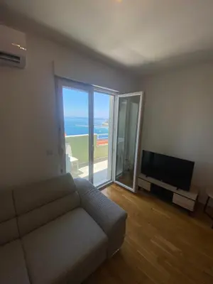 TV i/ili zabavni centar u objektu Comfort Sea View Apartment