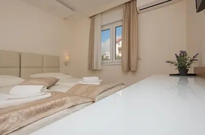 Krevet ili kreveti u jedinici u objektu Promajna Leone Erceg Apartments