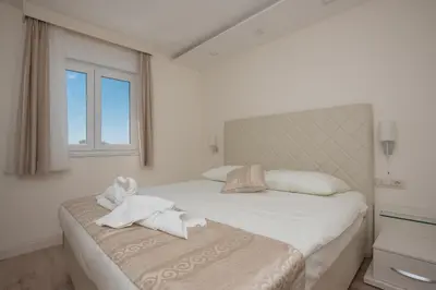 Krevet ili kreveti u jedinici u objektu Promajna Leone Erceg Apartments