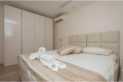 Krevet ili kreveti u jedinici u objektu Promajna Leone Erceg Apartments