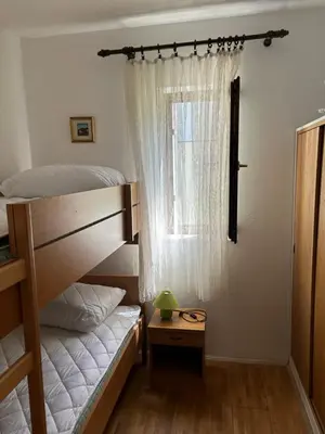 Krevet ili kreveti u jedinici u objektu Apartments Sonya Garden BBQ Supetar