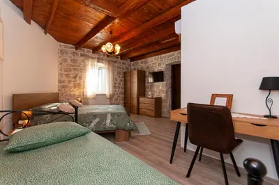 Krevet ili kreveti u jedinici u objektu New Villa OLE, stone house, sea view, jacuzzi