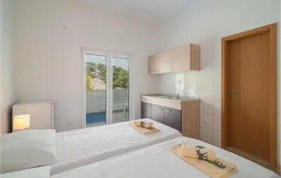 Krevet ili kreveti u jedinici u objektu Stunning Apartment In Supetar-Splitska With Wifi