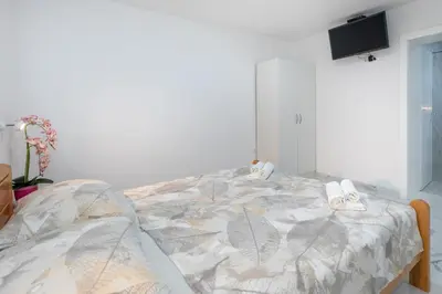 Krevet ili kreveti u jedinici u objektu Villa Ševo Baška Voda