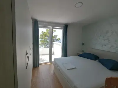 Krevet ili kreveti u jedinici u objektu Apartmani Mares - 20 m from the beach