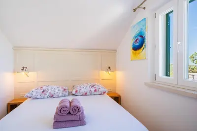 Krevet ili kreveti u jedinici u objektu Olive Park House Brač