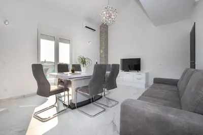 TV i/ili zabavni centar u objektu Apartments BlueView