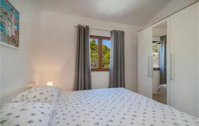 Krevet ili kreveti u jedinici u objektu 2 Bedroom Lovely Home In Praznica