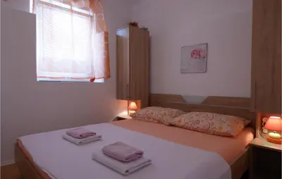 Krevet ili kreveti u jedinici u objektu 3 Bedroom Stunning Home In Mimice