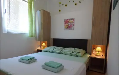 Krevet ili kreveti u jedinici u objektu 3 Bedroom Stunning Home In Mimice