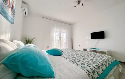 Krevet ili kreveti u jedinici u objektu 2 Bedroom Beautiful Apartment In Podstrana