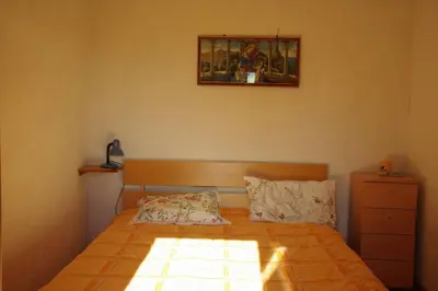 Krevet ili kreveti u jedinici u objektu maison ancienne sur l ile de Brac