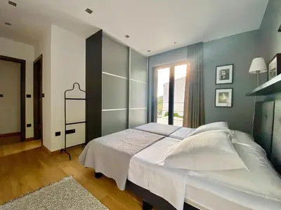 Krevet ili kreveti u jedinici u objektu Villa FORTE-Exclusive Retreat, Heated Infinity Pool & Amazing Views
