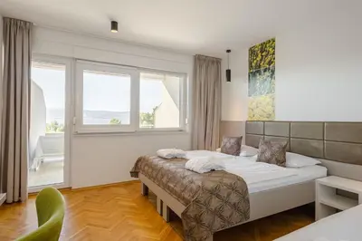 Krevet ili kreveti u jedinici u objektu Rogač Rooms & Restaurant
