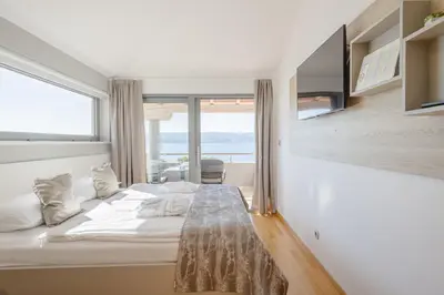 Krevet ili kreveti u jedinici u objektu Rogač Rooms & Restaurant