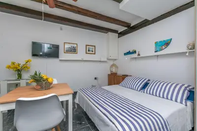 Krevet ili kreveti u jedinici u objektu Apartments Porto Duce
