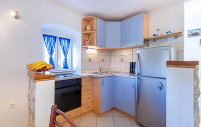 Kuhinja ili čajna kuhinja u objektu House Marta
